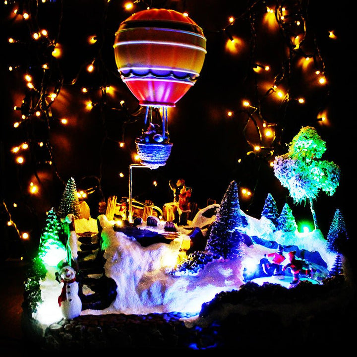 Village de Noël Animé et Musical avec Montgolfière et Patineurs - Silumen