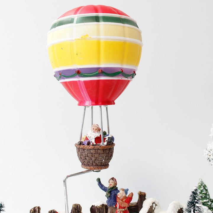 Village de Noël Animé et Musical avec Montgolfière et Patineurs - Silumen