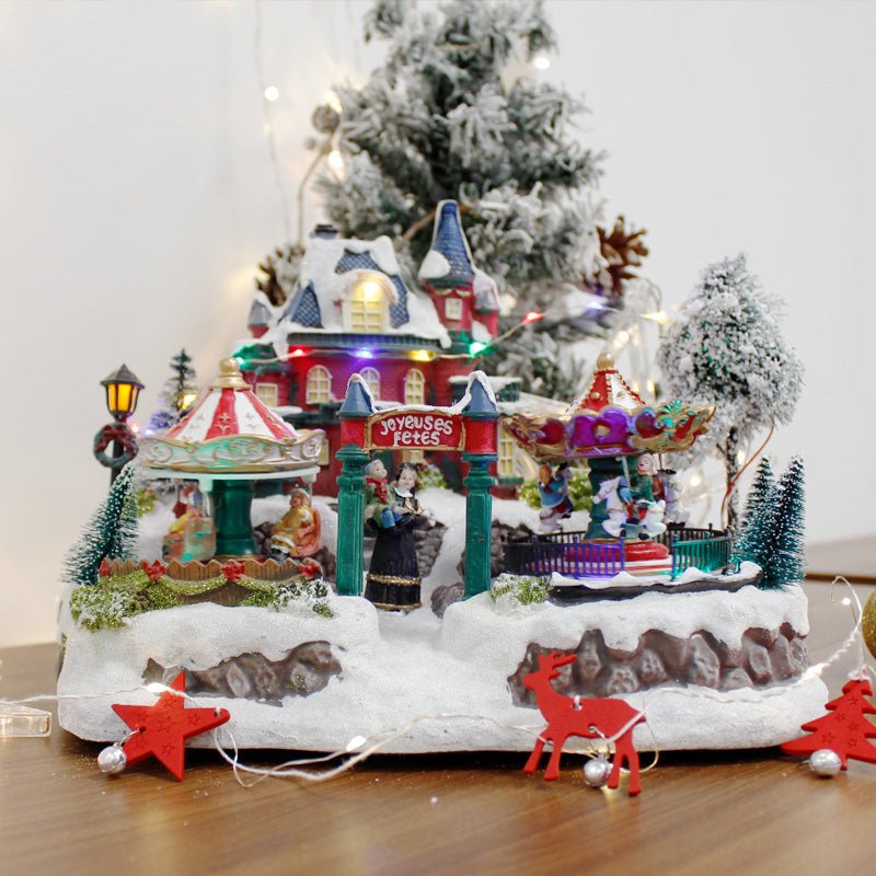 Bright and musical Christmas village with two rides – Silumen